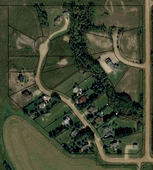 Satellite image of Westbrook neighbourhood. There are roads cutting through lush, green terrain.